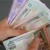 Украинцы начали активно забирать гривну из банков
