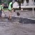 В Красноармейске кладут асфальт под дождем