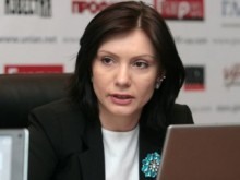 Е. Бондаренко расценивает обстрел авто, как попытку ее запугать