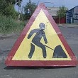 На улице Краснознаменской в Красноармейске укладывают асфальт