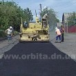 На улице Краснознаменской в Красноармейске укладывают асфальт